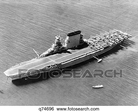 1930s 1940s 1935 AERIAL VIEW OF US NAVY SHIP WWII AIRCRAFT CARRIER USS SARATOGA WITH BIPLANE AIRCRAFT ASSEMBLED ON FLIGHT DECK View Large Photo Image Stock Photograph - 1930s 1940s 1935 AERIAL VIEW OF US NAVY SHIP WWII AIRCRAFT CARRIER USS SARATOGA WITH BIPLANE AIRCRAFT ASSEMBLED ON FLIGHT DECK. Fotosearch