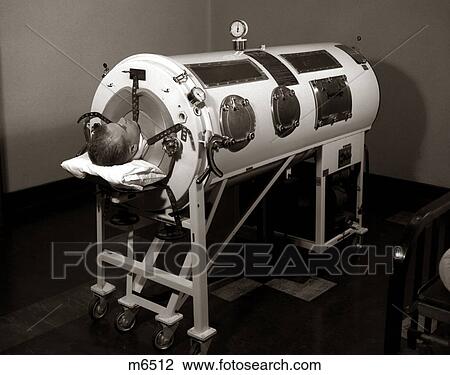 1930s 1940s 1950s MAN LYING IN IRON LUNG NEGATIVE PRESSURE VENTILATOR ARTIFICIAL BREATHING MACHINE View Large Photo Image Stock Image - 1930s 1940s 1950s MAN LYING IN IRON LUNG NEGATIVE PRESSURE VENTILATOR ARTIFICIAL BREATHING MACHINE. Fotosearch