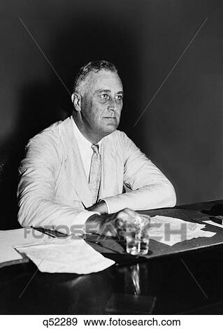 1930S 1940S Portrait Franklin Delano Roosevelt Fdr 32Nd American President Seated At Desk With Papers View Large Photo Image Stock Photo - 1930S 1940S Portrait Franklin Delano Roosevelt Fdr 32Nd American President Seated At Desk With Papers. Fotosearch