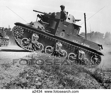 1930s 1940s SMALL AMERICAN ARMY M2 LIGHT TANK ON AN INCLINE BY SIDE OF ROAD View Large Photo Image Picture - 1930s 1940s SMALL AMERICAN ARMY M2 LIGHT TANK ON AN INCLINE BY SIDE OF ROAD. Fotosearch
