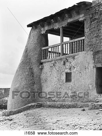 1930S Adobe Building Architecture Of San Esteban Del Rey Mission Today A Cultural Center Acoma Pueblo New Mexico Usa View Large Photo Image Stock Photo - 1930S Adobe Building Architecture Of San Esteban Del Rey Mission Today A Cultural Center Acoma Pueblo New Mexico Usa. Fotosearch