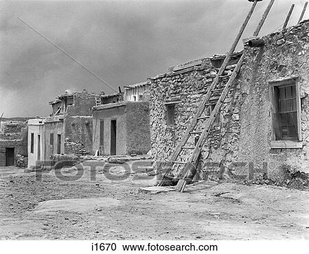 1930s ADOBE BUILDINGS ARCHITECTURE KIVA LADDER ACOMA PUEBLO NEW MEXICO USA View Large Photo Image Stock Image - 1930s ADOBE BUILDINGS ARCHITECTURE KIVA LADDER ACOMA PUEBLO NEW MEXICO USA. Fotosearch