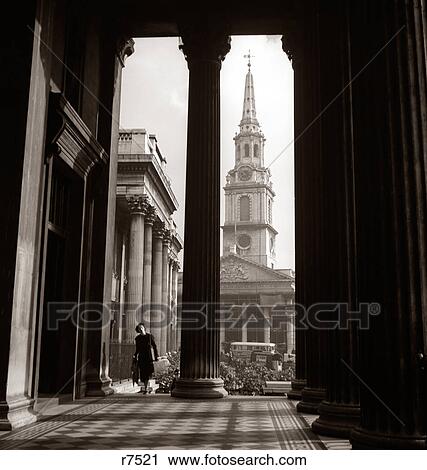 1930s ANONYMOUS SILHOUETTED WOMAN WALKING COLONNADE ST. MARTINS IN THE FIELD CHURCH LONDON ENGLAND View Large Photo Image Stock Image - 1930s ANONYMOUS SILHOUETTED WOMAN WALKING COLONNADE ST. MARTINS IN THE FIELD CHURCH LONDON ENGLAND. Fotosearch