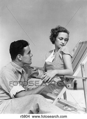 1930S Couple Lovers Quarrel Woman In Beach Chair Head Turned Away From Man Sitting Beside Her View Large Photo Image Picture - 1930S Couple Lovers Quarrel Woman In Beach Chair Head Turned Away From Man Sitting Beside Her. Fotosearch