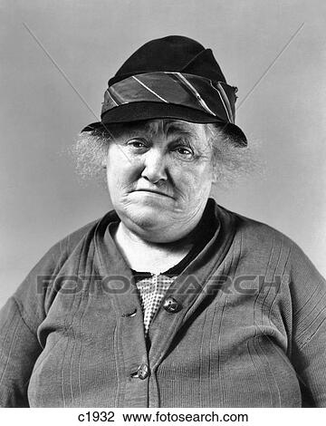1930s DEPRESSION ERA SENIOR WOMAN SAD FACIAL EXPRESSION WEARING SWEATER AND HAT LOOKING AT CAMERA View Large Photo Image Stock Image - 1930s DEPRESSION ERA SENIOR WOMAN SAD FACIAL EXPRESSION WEARING SWEATER AND HAT LOOKING AT CAMERA. Fotosearch
