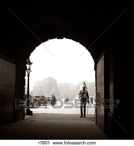 1930s DRAMATIC ANONYMOUS HORSE GUARD ARCHWAY FRAMING FIGURE WHITEHALL LONDON ENGLAND View Large Photo Image Stock Image - 1930s DRAMATIC ANONYMOUS HORSE GUARD ARCHWAY FRAMING FIGURE WHITEHALL LONDON ENGLAND. Fotosearch