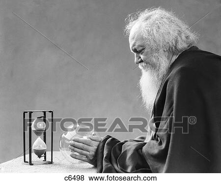 1930S Elderly Man White Beard Crystal Ball Hourglass Fortune Teller Seer Mystic View Large Photo Image Stock Photo - 1930S Elderly Man White Beard Crystal Ball Hourglass Fortune Teller Seer Mystic. Fotosearch