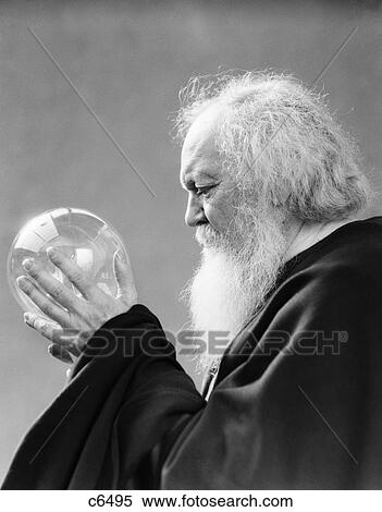 1930S Elderly Man White Beard Holding Crystal Glass Ball In Hands Mystic Fortune Teller View Large Photo Image Stock Photography - 1930S Elderly Man White Beard Holding Crystal Glass Ball In Hands Mystic Fortune Teller. Fotosearch
