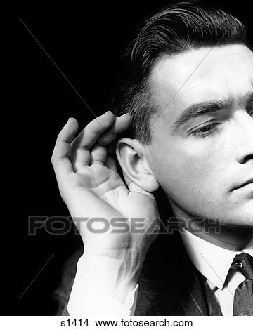 1930S Man Hand Cupping His Ear Listening Hearing View Large Photo Image Picture - 1930S Man Hand Cupping His Ear Listening Hearing. Fotosearch
