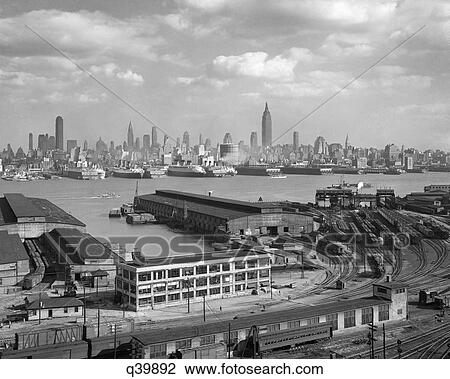 1930S Manhattan Nyc Skyline Rockefeller Center To 14Th Street And Ocean Liners View From Weehawken Nj Usa View Large Photo Image Stock Image - 1930S Manhattan Nyc Skyline Rockefeller Center To 14Th Street And Ocean Liners View From Weehawken Nj Usa. Fotosearch