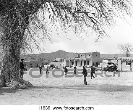 1930S Native American Group Playing Shinny Hockey Game North Plaza Of San Ildefonso Pueblo New Mexico Usa View Large Photo Image Stock Photograph - 1930S Native American Group Playing Shinny Hockey Game North Plaza Of San Ildefonso Pueblo New Mexico Usa. Fotosearch