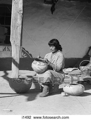 1930s NATIVE AMERICAN INDIAN WOMAN DECORATING POTTERY COCHITI PUEBLO NEW MEXICO USA View Large Photo Image Stock Image - 1930s NATIVE AMERICAN INDIAN WOMAN DECORATING POTTERY COCHITI PUEBLO NEW MEXICO USA. Fotosearch