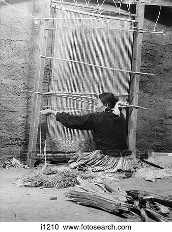 1930S Native American Navajo Woman Seated At Loom Weaving A Rug View Large Photo Image Stock Image - 1930S Native American Navajo Woman Seated At Loom Weaving A Rug. Fotosearch