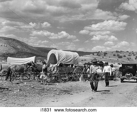 1930S Native Americans Men Women Cars Wagons Horses Gathering For Corn Dance & Fiesta Laguna Pueblo New Mexico View Large Photo Image Stock Image - 1930S Native Americans Men Women Cars Wagons Horses Gathering For Corn Dance & Fiesta Laguna Pueblo New Mexico . Fotosearch