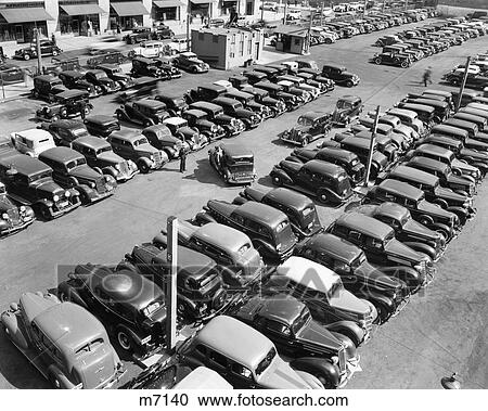1930s OVERHEAD VIEW LOOKING DOWN ON CROWDED PARKING LOT FULL OF PARKED CARS View Large Photo Image Stock Image - 1930s OVERHEAD VIEW LOOKING DOWN ON CROWDED PARKING LOT FULL OF PARKED CARS. Fotosearch