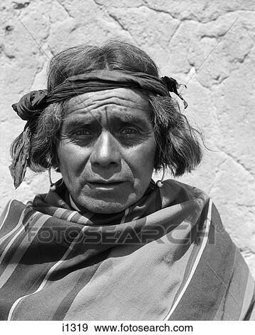 1930S Portrait Native American Indian Man Of The Cochiti Pueblo Looking At Camera New Mexico Usa View Large Photo Image Stock Photo - 1930S Portrait Native American Indian Man Of The Cochiti Pueblo Looking At Camera New Mexico Usa. Fotosearch