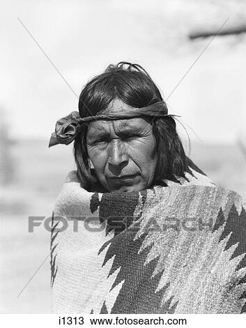 1930S Serious Portrait Native American Indian Man Cochiti Pueblo Wrapped In Handwoven Blanket Looking At Camera New Mexico Usa View Large Photo Image Stock Image - 1930S Serious Portrait Native American Indian Man Cochiti Pueblo Wrapped In Handwoven Blanket Looking At Camera New Mexico Usa. Fotosearch