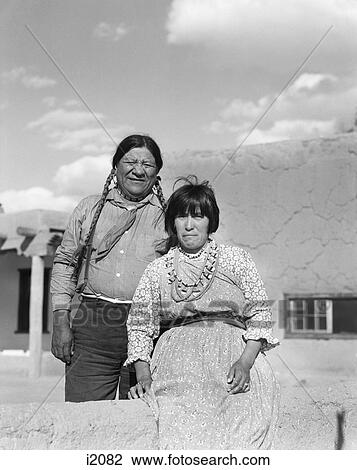 1930S Smiling Native American Couple Man Woman Husband Wife Looking At Camera Portrait San Ildefonso Pueblo New Mexico Usa View Large Photo Image Stock Image - 1930S Smiling Native American Couple Man Woman Husband Wife Looking At Camera Portrait San Ildefonso Pueblo New Mexico Usa. Fotosearch