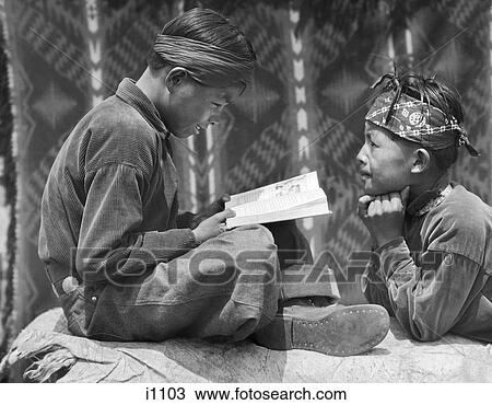 1930S Two Native American Navajo Boys Reading Book View Large Photo Image Stock Image - 1930S Two Native American Navajo Boys Reading Book . Fotosearch