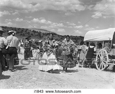 1930S Two Native American Navajo Women In Typical Costumes At The Corn Dance & Fiest At Laguna Pueblo New Mexico View Large Photo Image Stock Image - 1930S Two Native American Navajo Women In Typical Costumes At The Corn Dance & Fiest At Laguna Pueblo New Mexico . Fotosearch