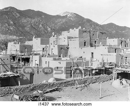 1930s VIEW OF ADOBE BUILDINGS AND ARCHITECTURE OF TAOS PUEBLO NEW MEXICO USA View Large Photo Image Stock Photo - 1930s VIEW OF ADOBE BUILDINGS AND ARCHITECTURE OF TAOS PUEBLO NEW MEXICO USA. Fotosearch