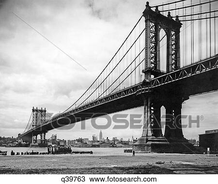 1930S View Of Manhattan Bridge Across East River From Brooklyn New York City Ny Usa View Large Photo Image Stock Image - 1930S View Of Manhattan Bridge Across East River From Brooklyn New York City Ny Usa. Fotosearch