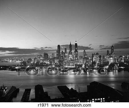 1940S 1950S Downtown Manhattan East Side Financial Area Night Skyline New York City Ny Usa View Large Photo Image Stock Image - 1940S 1950S Downtown Manhattan East Side Financial Area Night Skyline New York City Ny Usa. Fotosearch