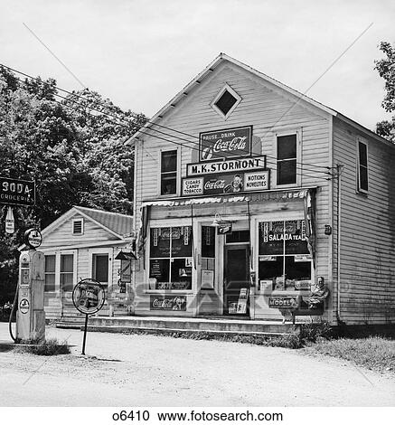 1940S 1950S Man Stilling On Porch General Store And Richfield Gas Station Amid Signs For Coca-Cola Salada Tea Public Telephone View Large Photo Image Stock Image - 1940S 1950S Man Stilling On Porch General Store And Richfield Gas Station Amid Signs For Coca-Cola Salada Tea Public Telephone . Fotosearch