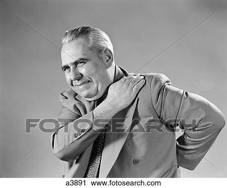 1940S 1950S Senior Man Grimace Pain Shoulder And Back View Large Photo Image Stock Image - 1940S 1950S Senior Man Grimace Pain Shoulder And Back. Fotosearch