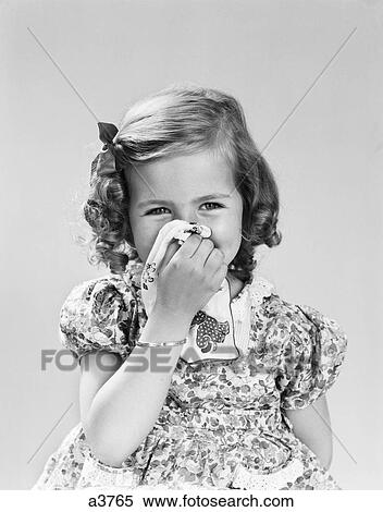 Stock Photography - 1940S Little Girl Blowing Her Nose With Cloth Handkerchief . Fotosearch