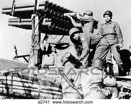 1940s MEN SOLDIERS LOADING T-34 ROCKET LAUNCHER MOUNTED ON SHERMAN M-4 TANK WORLD WAR 2 WWII View Large Photo Image Stock Image - 1940s MEN SOLDIERS LOADING T-34 ROCKET LAUNCHER MOUNTED ON SHERMAN M-4 TANK WORLD WAR 2 WWII. Fotosearch
