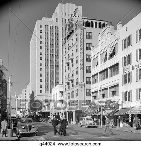 1940s SAILORS CROSSING FLAGLER STREET LOOK TOWARD DUPONT OFFICE BUILDING MIAMI FLORIDA USA View Large Photo Image Picture - 1940s SAILORS CROSSING FLAGLER STREET LOOK TOWARD DUPONT OFFICE BUILDING MIAMI FLORIDA USA. Fotosearch