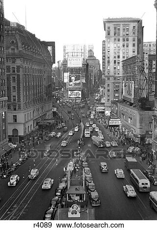 1940s TIMES SQUARE LOOKING NORTH FROM 43RD STREET FROM THE TIMES BUILDING TO DUFFY SQUARE MANHATTAN NYC USA View Large Photo Image Stock Photo - 1940s TIMES SQUARE LOOKING NORTH FROM 43RD STREET FROM THE TIMES BUILDING TO DUFFY SQUARE MANHATTAN NYC USA. Fotosearch