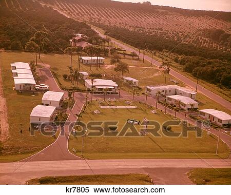1950s 1960s AERIAL VIEW OF HIGHWAY TRAVEL MOTEL IN MIDDLE OF CITRUS GROVE CLERMONT FLORIDA USA View Large Photo Image Stock Photography - 1950s 1960s AERIAL VIEW OF HIGHWAY TRAVEL MOTEL IN MIDDLE OF CITRUS GROVE CLERMONT FLORIDA USA. Fotosearch