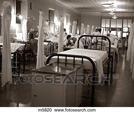 1950s 1960s CROWDED HOSPITAL WARD BEDS NURSES DOCTORS PATIENTS View Large Photo Image Stock Image - 1950s 1960s CROWDED HOSPITAL WARD BEDS NURSES DOCTORS PATIENTS. Fotosearch