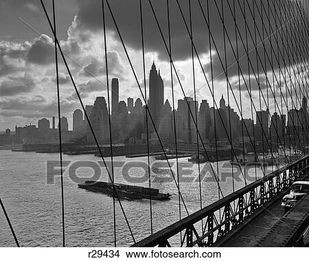 1950S 1960S Downtown Manhattan Skyline From Brooklyn Bridge View Large Photo Image Picture - 1950S 1960S Downtown Manhattan Skyline From Brooklyn Bridge. Fotosearch