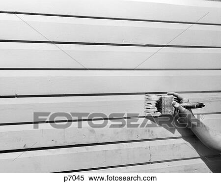 1950S 1960S Hand Painting Wooden Siding With Paintbrush View Large Photo Image Stock Photography - 1950S 1960S Hand Painting Wooden Siding With Paintbrush. Fotosearch