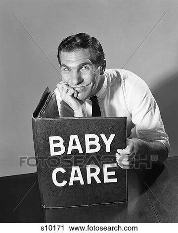 1950s 1960s MAN FATHER HAND ON CHIN READING LARGE BOOK TITLED BABY CARE SMILING LOOKING AT CAMERA View Large Photo Image Stock Image - 1950s 1960s MAN FATHER HAND ON CHIN READING LARGE BOOK TITLED BABY CARE SMILING LOOKING AT CAMERA. Fotosearch