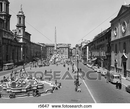 1950s 1960s PIAZZA NAVONA VIEW OF CITY SQUARE WITH FOUNTAINS ROME ITALY View Large Photo Image Stock Photo - 1950s 1960s PIAZZA NAVONA VIEW OF CITY SQUARE WITH FOUNTAINS ROME ITALY. Fotosearch