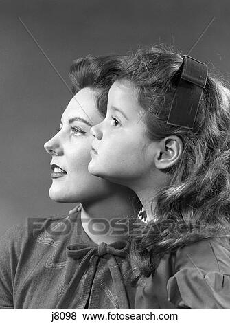 1950S 1960S Profile Portrait Woman Girl Mother Daugher View Large Photo Image Stock Photo - 1950S 1960S Profile Portrait Woman Girl Mother Daugher . Fotosearch