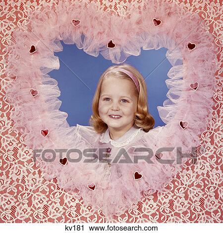 1950s 1960s SMILING BLOND GIRL POSING INSIDE A LACE VALENTINE HEART View Large Photo Image Stock Image - 1950s 1960s SMILING BLOND GIRL POSING INSIDE A LACE VALENTINE HEART. Fotosearch