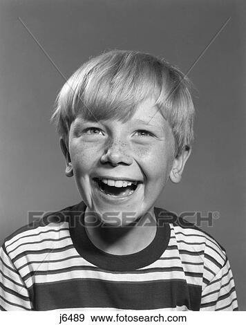1950s 1960s SMILING LAUGHING HAPPY FRECKLE FACED BLOND BOY WEARING STRIPED TEE SHIRT DENNIS THE MENACE TYPE LOOKING AT CAMERA View Large Photo Image Stock Photo - 1950s 1960s SMILING LAUGHING HAPPY FRECKLE FACED BLOND BOY WEARING STRIPED TEE SHIRT DENNIS THE MENACE TYPE LOOKING AT CAMERA. Fotosearch