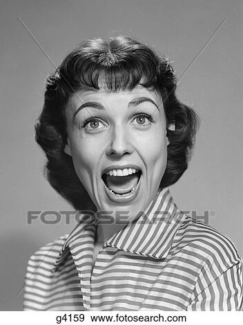 1950s 1960s WOMAN BRUNETTE SMILING LAUGHING MOUTH OPEN WIDE HAPPY FUNNY FACE LOOKING AT CAMERA WEARING STRIPED BLOUSE View Large Photo Image Stock Photo - 1950s 1960s WOMAN BRUNETTE SMILING LAUGHING MOUTH OPEN WIDE HAPPY FUNNY FACE LOOKING AT CAMERA WEARING STRIPED BLOUSE. Fotosearch
