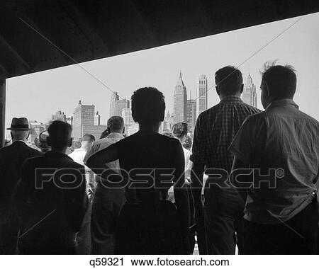 1950S Anonymous Silhouetted Passengers On Staten Island Ferry Coming Into Downtown Manhattan New York City Ny Usa View Large Photo Image Stock Image - 1950S Anonymous Silhouetted Passengers On Staten Island Ferry Coming Into Downtown Manhattan New York City Ny Usa. Fotosearch