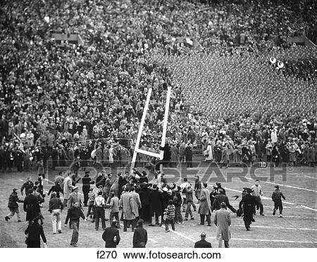 1950S Army Navy Game Excited Spectators Crowd Tearing Down Goal Posts Navy Won The Game View Large Photo Image Stock Image - 1950S Army Navy Game Excited Spectators Crowd Tearing Down Goal Posts Navy Won The Game. Fotosearch