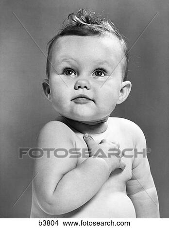 1950S Baby Looking Up Holding Right Hand Over Heart Pledge View Large Photo Image Picture - 1950S Baby Looking Up Holding Right Hand Over Heart Pledge. Fotosearch