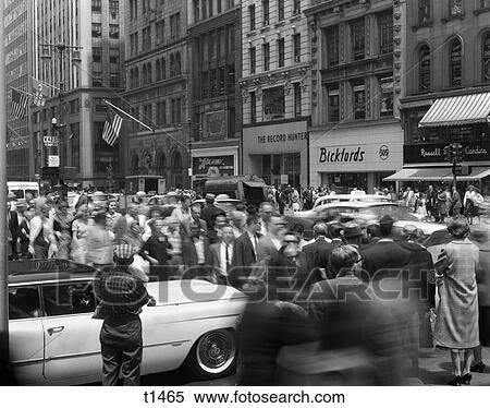 1950S Crowd Of Pedestrians Cars Fifth Avenue 42Nd Street New York City Manhattan Urban Congestion Blurred Motion Rush Hour View Large Photo Image Stock Photography - 1950S Crowd Of Pedestrians Cars Fifth Avenue 42Nd Street New York City Manhattan Urban Congestion Blurred Motion Rush Hour. Fotosearch