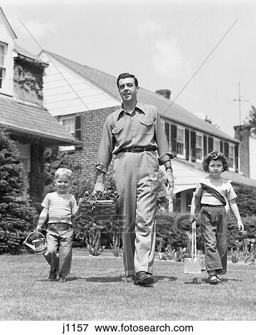 1950s FATHER WITH TWO CHILDREN DAUGHTER AND SON WALKING IN FRONT YARD CARRYING GARDENING TOOLS LOOKING AT CAMERA View Large Photo Image Stock Photo - 1950s FATHER WITH TWO CHILDREN DAUGHTER AND SON WALKING IN FRONT YARD CARRYING GARDENING TOOLS LOOKING AT CAMERA. Fotosearch