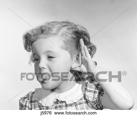 1950S Little Girl Making Rude Gesture Sticking Out Tongue Cupping Hand On Ear View Large Photo Image Stock Photograph - 1950S Little Girl Making Rude Gesture Sticking Out Tongue Cupping Hand On Ear. Fotosearch