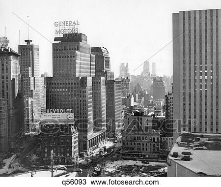 Stock Image - 1950S Looking South At 61St Street Coliseum Tower Columbus Circle Excavation For New Building Bottom Center New York City Ny Usa. Fotosearch